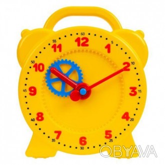 Пластиковая игрушка "Часы" сможет ознакомить малыша с принципом действия часовог. . фото 1