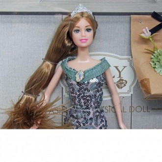 Лялька в красивій дизайнерській сукні та туфельках, з довгим красивим волоссям. . . фото 3