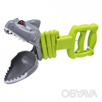 Цікава іграшка виконана у вигляді динозавра, що вміє захоплювати предмети ротом.. . фото 1