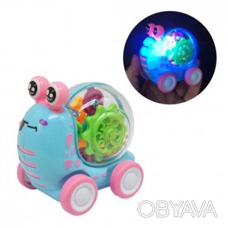 Інерційна іграшка на колесах у вигляді милого равлики. Усередині панцира - механ. . фото 1