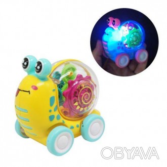 Інерційна іграшка на колесах у вигляді милого равлики. Усередині панцира - механ. . фото 1