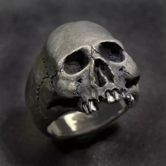 Мужское кольцо бижутерия череп з зубами размер 18-21 мм.
Материал: сплав.
Диамет. . фото 2