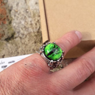 Мужское женское кольцо глаз дракона зеленый размер регулируется.
Бижутерний спла. . фото 2