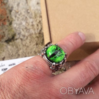 Мужское женское кольцо глаз дракона зеленый размер регулируется.
Бижутерний спла. . фото 1