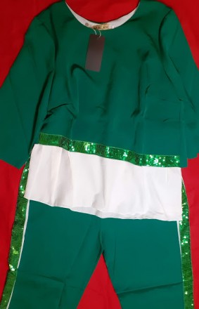 костюм с пайетками зелений
костюмка + шифон
. . фото 3