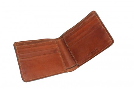
 
 Солідний, зручний гаманець з натуральної шкіри.
Матеріал: натуральна шкіра;
. . фото 5