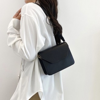 
ВИДЕООБЗОР
Женская классическая сумочка
Клатч на широком ремешке на одно отделе. . фото 6