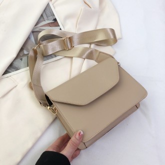 
ВИДЕООБЗОР
Женская классическая сумочка
Клатч на широком ремешке на одно отделе. . фото 2