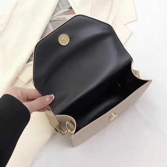 
ВИДЕООБЗОР
Женская классическая сумочка
Клатч на широком ремешке на одно отделе. . фото 7