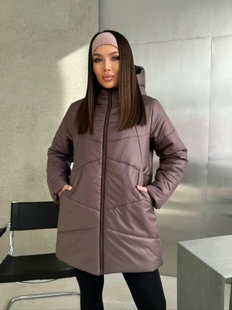 
Женская зимняя куртка средней длины с капюшоном.
Код 016953
Куртка стеганая с к. . фото 19