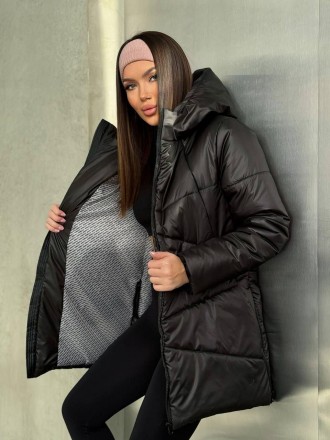 
Женская зимняя куртка средней длины с капюшоном.
Код 016953
Куртка стеганая с к. . фото 14