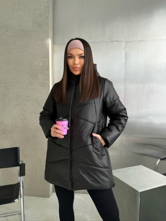 
Женская зимняя куртка средней длины с капюшоном.
Код 016953
Куртка стеганая с к. . фото 10