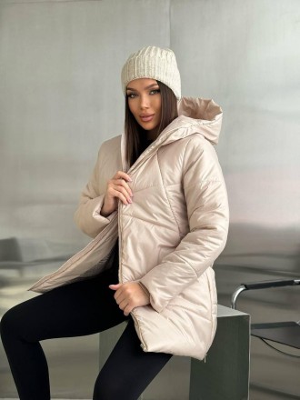 
Женская зимняя куртка средней длины с капюшоном.
Код 016953
Куртка стеганая с к. . фото 6