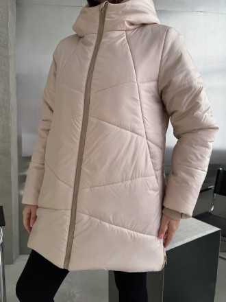 
Женская зимняя куртка средней длины с капюшоном.
Код 016953
Куртка стеганая с к. . фото 5