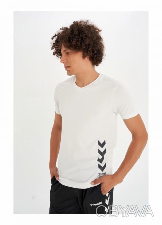 Бавовняна футболка Hummel. Виконана з м'якої бавовняної тканини з принтом логоти. . фото 1