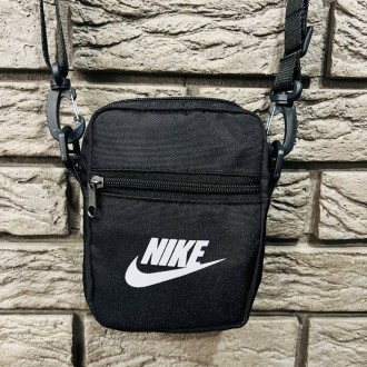 
 
 Барсетка черная small Nike белый логотип:
- Размер: 18* 13 см;
- Материал: О. . фото 2