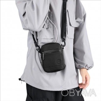 Чоловіча маленька компактна сумка через плече, на пояс тканинна чорна.
Розмір: 1. . фото 1