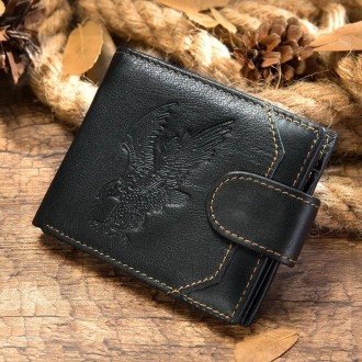 Стильне портмоне гаманець виготовлений з натуральної шкіри з малюнком тисненням . . фото 2