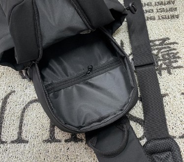 Чоловіча сумка через плече, на груди, за спину, рюкзак слінг тканинний чорний.
Р. . фото 6