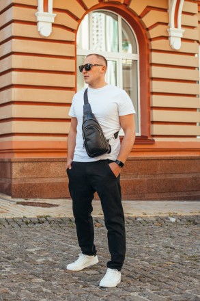 
Мужской кожаный рюкзак-слинг на одно плечо TidinBag 7909 черный
Характеристики
. . фото 4