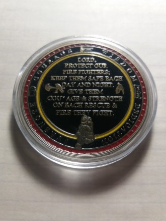 Монета пожежник. Напис на монеті "Першим увійшов останнім вийшов" Моне. . фото 3