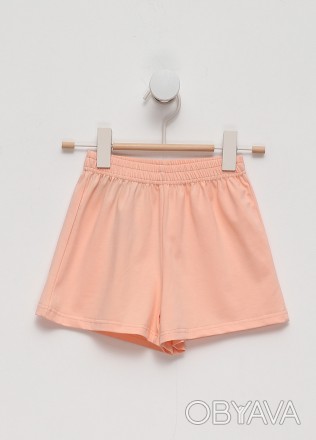 Персиковые шорты для девочек - это эффектный и легкий выбор для стильного гардер. . фото 1