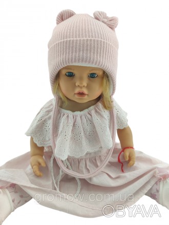 
Тепла в'язана дитяча шапка на зав'язках. Дуже приємна, м'яка та тепла тканина. . . фото 1
