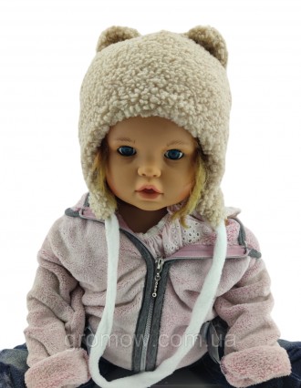 
Тепла ведмедик-тидді дитяча шапка на зав'язках. Дуже приємна, м'яка та тепла тк. . фото 2