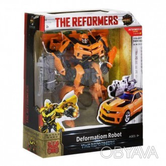 Робот-трансформер "The Reformers" зі зброєю. Трансформується з робота в автомобі. . фото 1