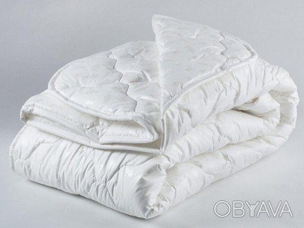 Одеяло с наполнителем из искусственного лебяжего пуха
 
 
Ткань ― 100% хлопок
 
. . фото 1
