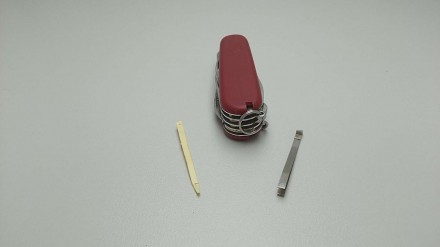 Складаний багатофункційний ніж від Victorinox. Червона пластикова ручка. Функції. . фото 6