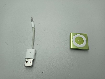 Любимые мелодии всегда будут с вами, ведь iPod shuffle работает без подзарядки д. . фото 2