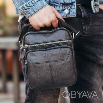 
Чоловіча сумка-барсетка через плече шкірянаTiding Bag M2837A
 
Характеристики:
. . фото 1