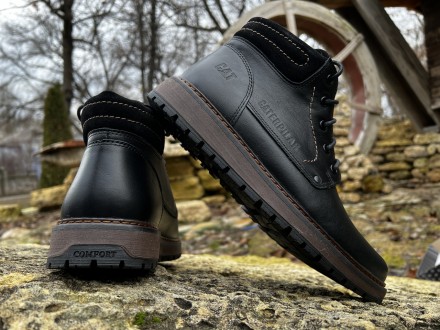 Шкіряні зимові черевики на хутрі CAT Black Boots
CAT — не просто гарне взуття, а. . фото 5