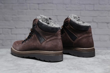 Зимові шкіряні черевики на хутрі коричневі
Міцний верх із натуральної шкіри та в. . фото 4