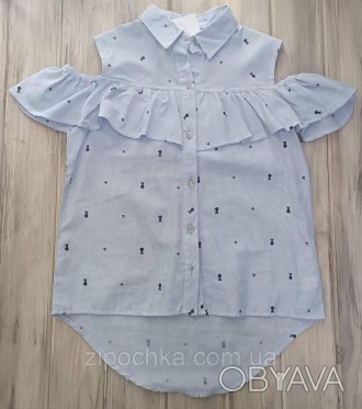 
Блузка в смужку для дівчинки на зріст 140
Пошита із натуральної легкої тканини.. . фото 1