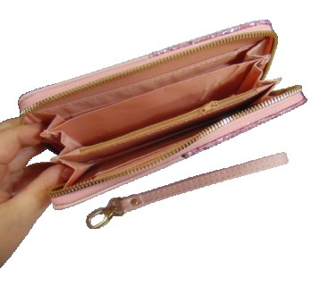 Женский кошелек на молнии со съемной ручкой
3 отделения для купюр
1 отделение на. . фото 3