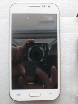 Смартфон Samsung G361H/DS (SEK) White. В'єтнам. Дві SIM-картки. Не новий

. . фото 3