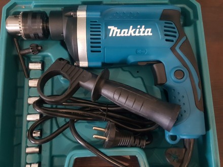 Опис:
Ударний дриль Makita HP1630 - це професійний інструмент, модель ідеально п. . фото 2