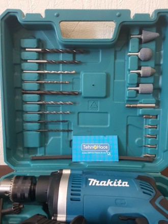 Опис:
Ударний дриль Makita HP1630 - це професійний інструмент, модель ідеально п. . фото 9