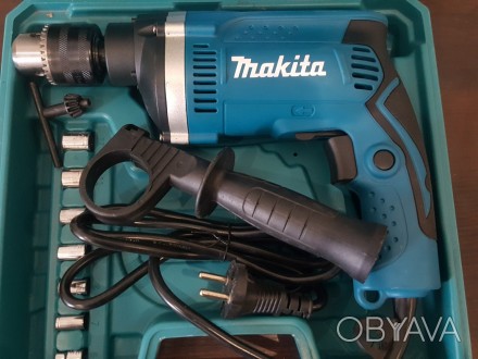 Опис:
Ударний дриль Makita HP1630 - це професійний інструмент, модель ідеально п. . фото 1