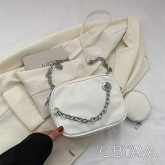 
Женская сумочка кросс-боди на один отдел + кошелек с серебряной фурнитурой
Разм. . фото 1