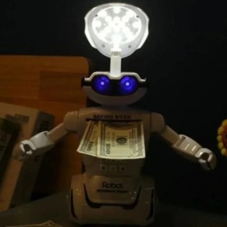 Робот-копилка, это одновременно и игрушка и копилка и светильник, и сейф с кодов. . фото 5