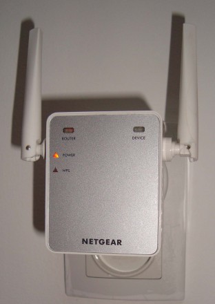 Бездротовий маршрутизатор Netgear N300 WiFi Range Extender
Универсальный WiFi р. . фото 5
