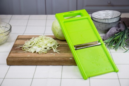 Ручная пластиковая шинковка для кухни представляет собой эффективный инструмент . . фото 5