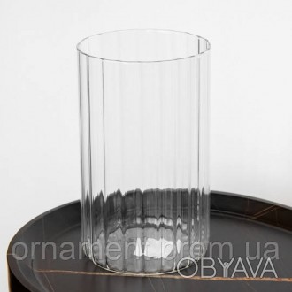 
Скляна ваза поєднує в собі елегантність і стиль, створюючи ідеальну основу для . . фото 1