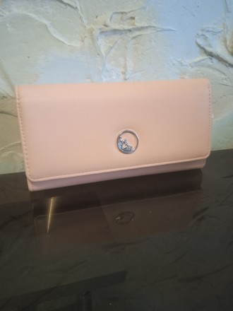 Жіночий гаманець клатч

Стильний та дуже функціональний аксесуар для сучасної . . фото 2