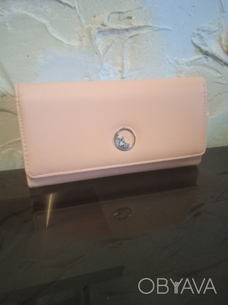 Жіночий гаманець клатч

Стильний та дуже функціональний аксесуар для сучасної . . фото 1