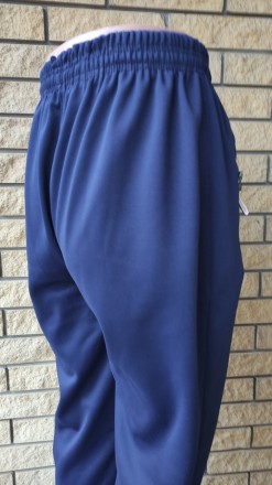 Спортивные штаны утепленные на флисе трикотажные больших размеров с широкой штан. . фото 5