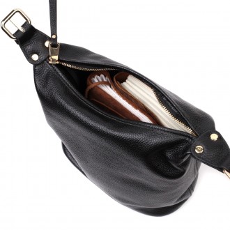 Жіноча вертикальна сумка з натуральної м'якої шкіри.
Сумку можна носити на плечі. . фото 5